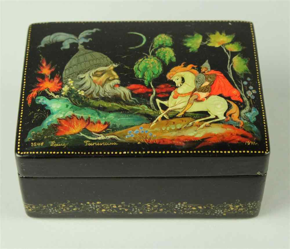 Appraisal: RUSSIAN LACQUER BOX colorfully painted with a mounted warrior on