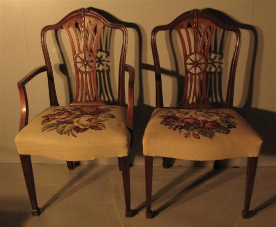 Appraisal: th century mahogany open arm dining chair and a matching