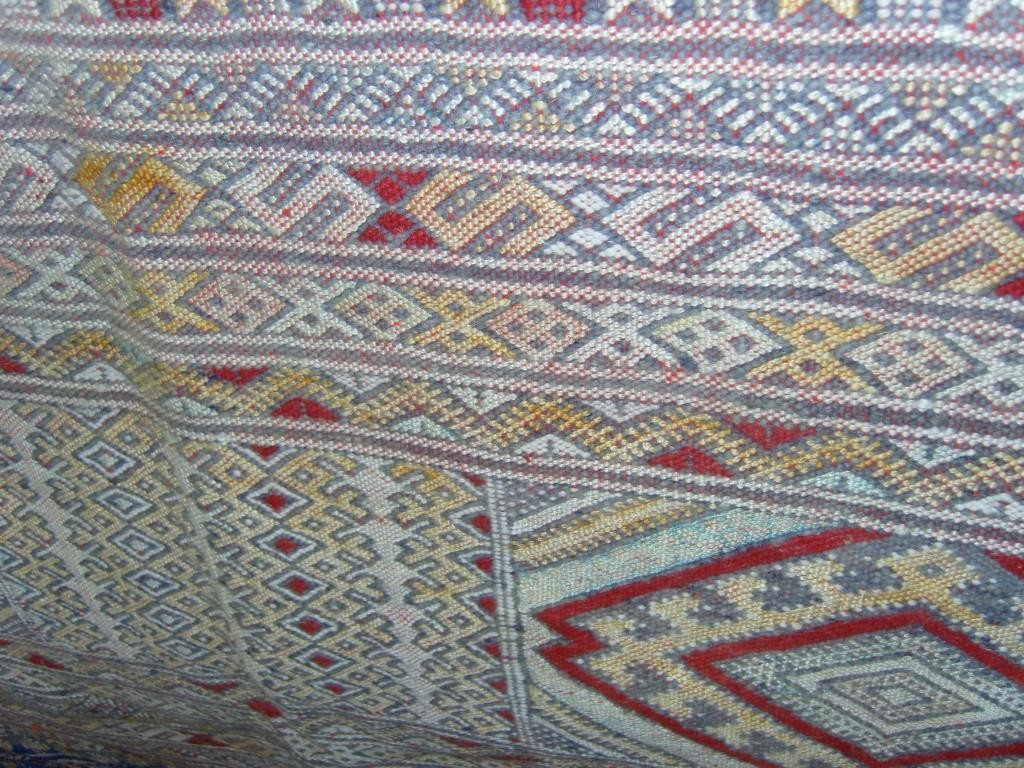 Appraisal: A flat woven eastern rug with striped geometric decoration in