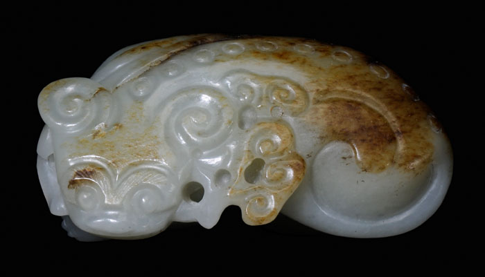 Appraisal: Jade Beast Chinese th th century pale celadon with dark