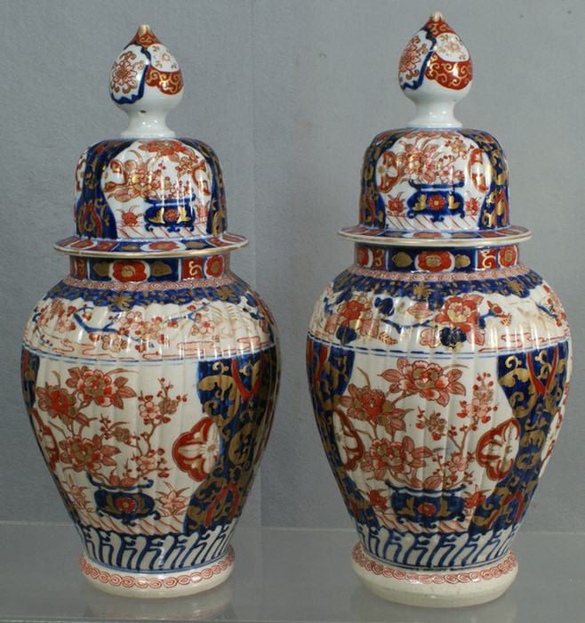 Appraisal: Pair of Japanese Imari ribbed and covered jars approximately tall