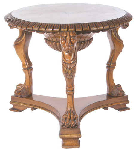 Appraisal: ENGLISH OAK Round table with three leopard-headed and clawed caryatid