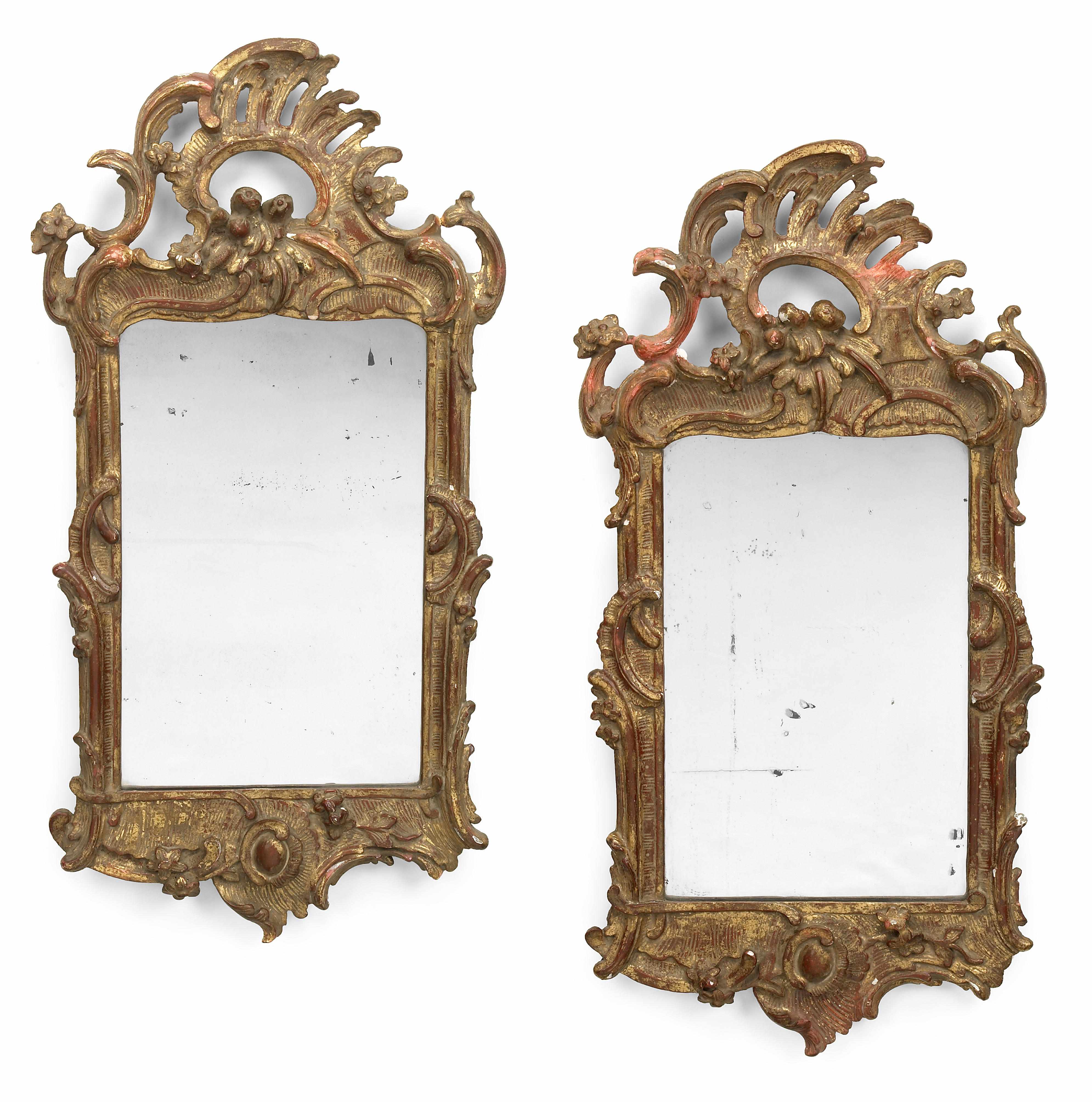 Appraisal: A pair of Louis XV carved giltwood mirrors third quarter