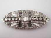 Appraisal: An Art Deco platinum and diamond double clip brooch set