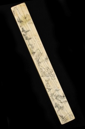 Appraisal: Solid ivory bar incised and inked with scene of scholar