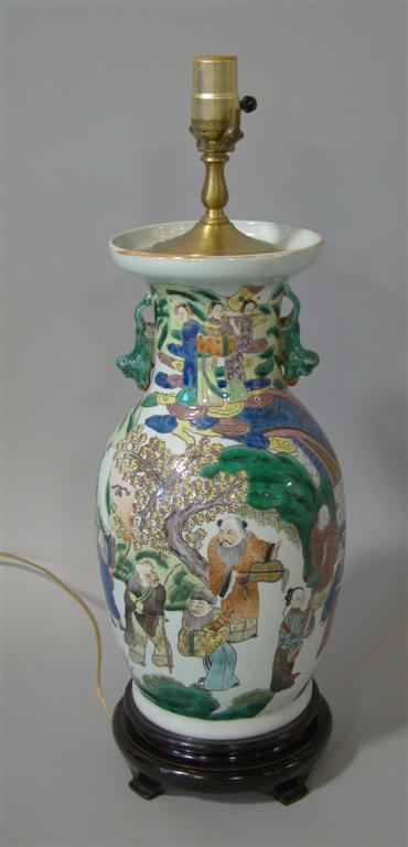 Appraisal: FAMILLE ROSE LAMP With figures in a landscape on a