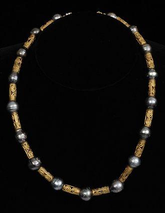 Appraisal: BLACK BAROQUE PEARL AND GOLD BEAD NECKLACE in Provenance Property