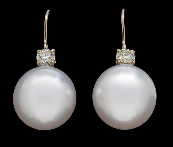 Appraisal: A pair of South Sea cultured pearl and diamond earrings