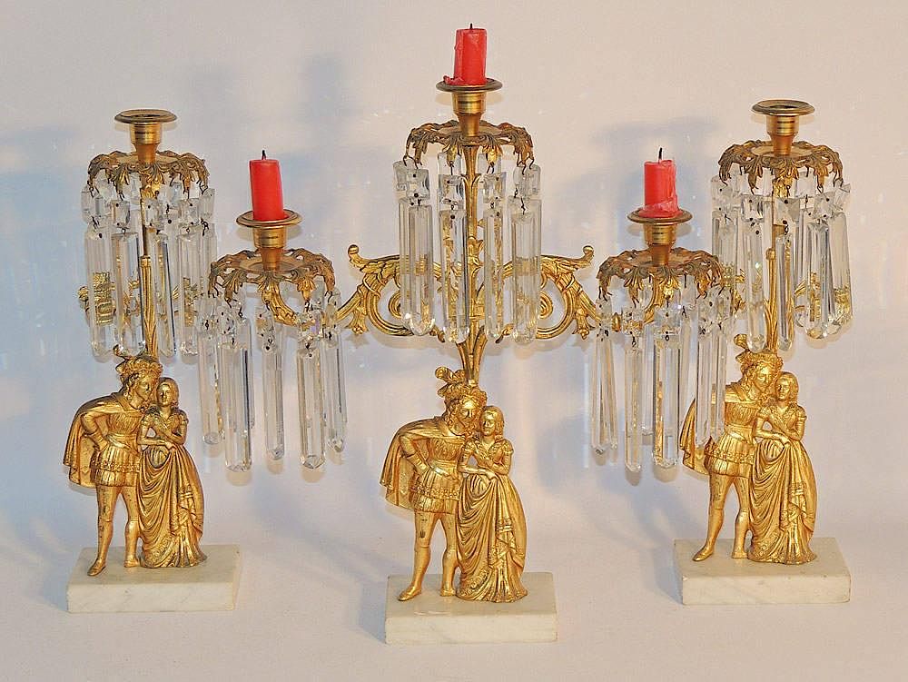 Appraisal: Bronze Dore Candelabra Set With figural supports on marble bases