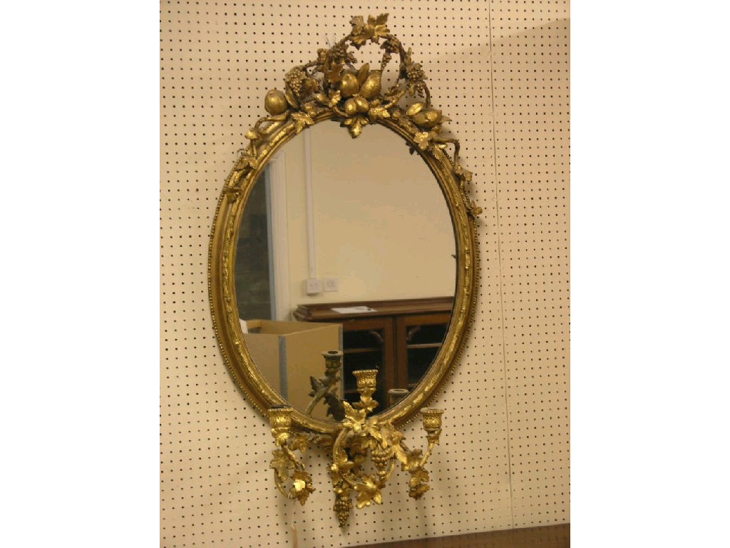 Appraisal: A Victorian gilt-gesso girandole oval shape with fruit and vine