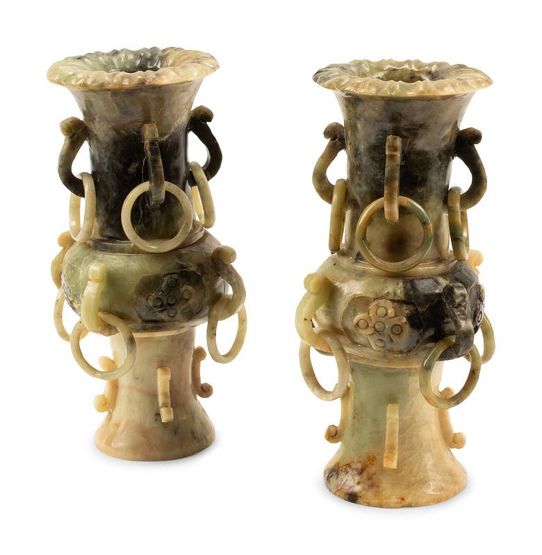 Appraisal: A Pair of Chinese Archaistic Carved Hardstone Vases Height inches