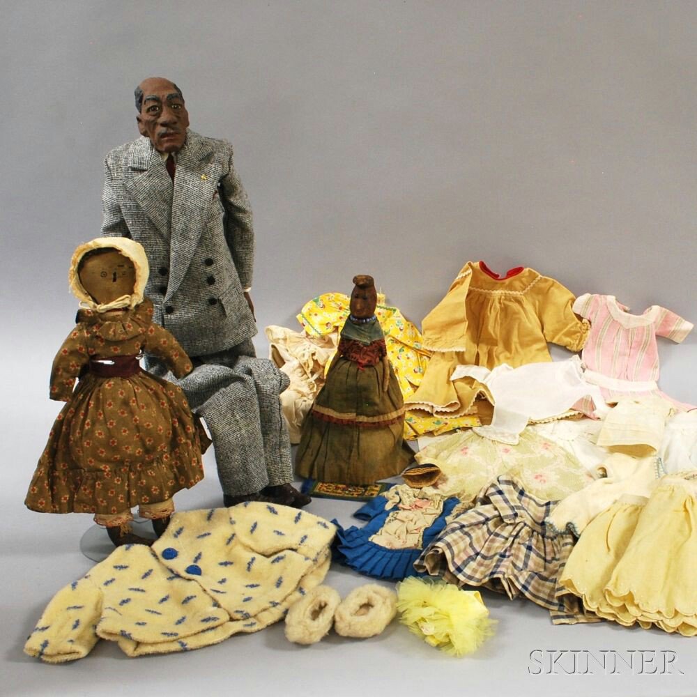 Appraisal: Three African-American Dolls and Miscellaneous Doll Clothing including a cloth