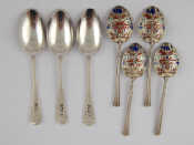 Appraisal: A set of four silver coffee spoons with cloisonne enamelled