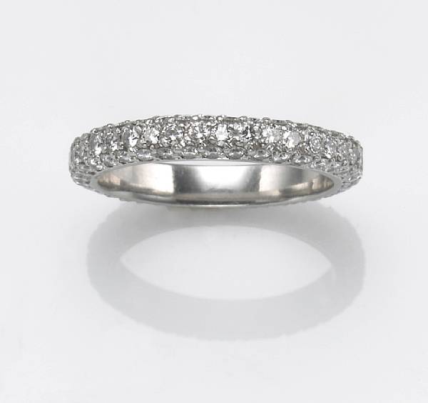 Appraisal: A diamond and platinum eternity band estimated total diamond weight