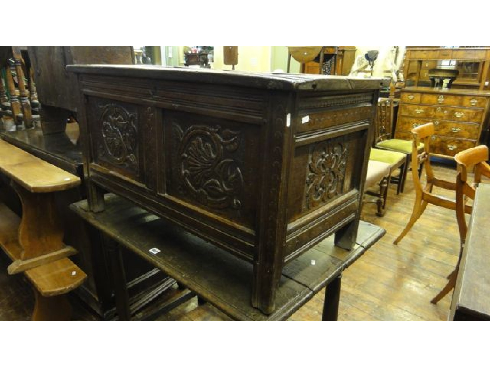 Appraisal: A small th century or earlier panelled oak coffer with