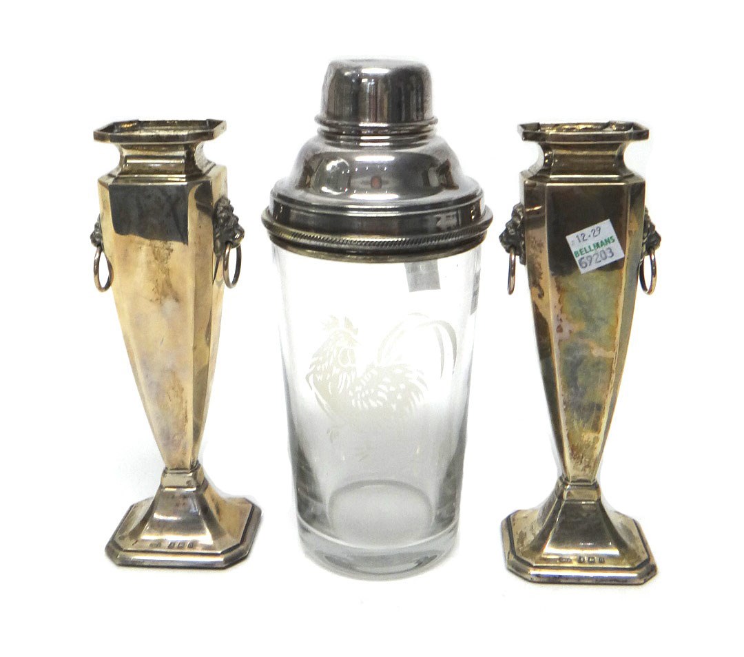 Appraisal: A pair of silver vases each of tapering form and