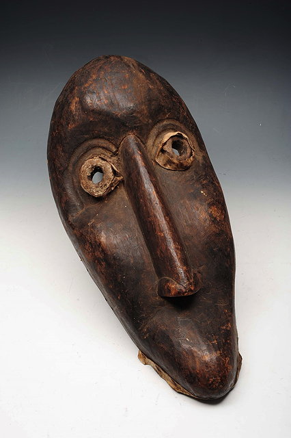 Appraisal: AN IVORY COAST GUERE WOBE WOODEN MASK of elongated form