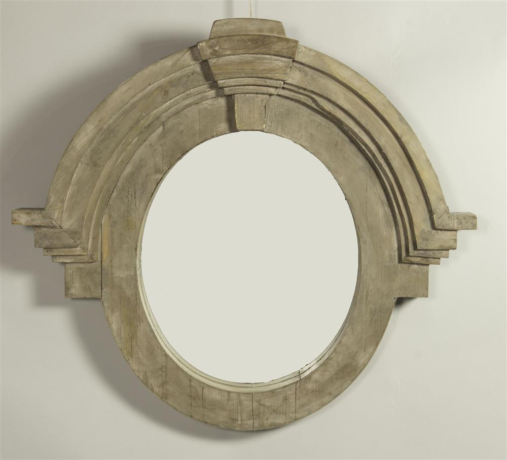 Appraisal: CLASSICAL STYLE ARCHITECTURAL OVAL MIRROR having stacked and molded cornice