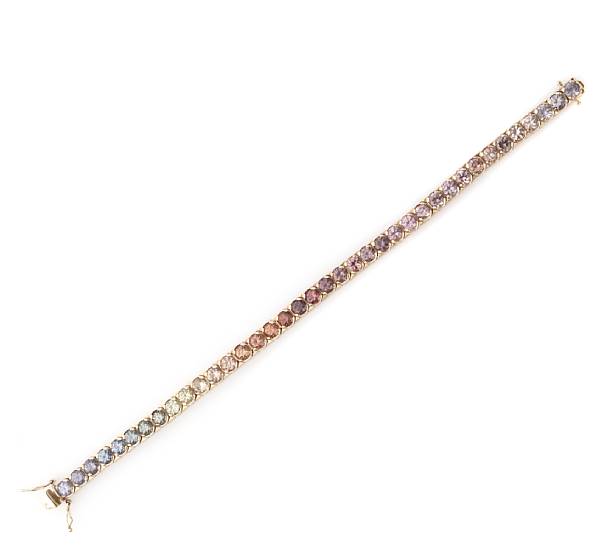 Appraisal: A rainbow sapphire and k gold bracelet length in