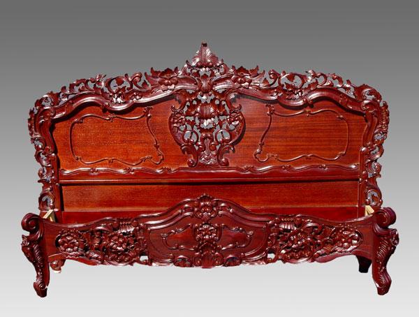 Appraisal: KING SIZED CARVED MAHOGANY BED Heavy carved rich dark colonial