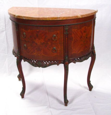 Appraisal: French demilune marble top commode marquetry inlaid with carved body