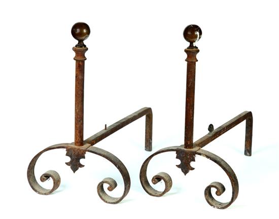 Appraisal: PAIR OF ANDIRONS American th century Wrought iron with scrolled