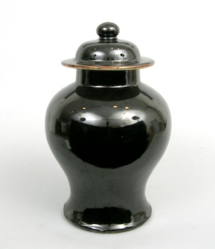 Appraisal: A Porcelain Monochrome Temple Jar with Lid Chinese A baluster