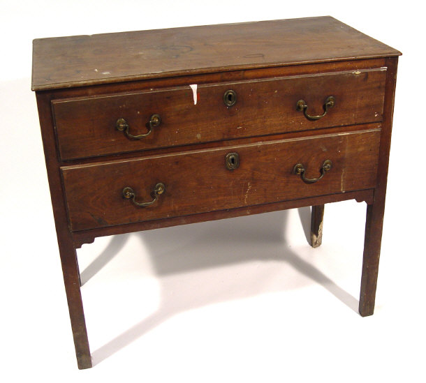 Appraisal: Georgian mahogany chest fitted with two drawers supported by square