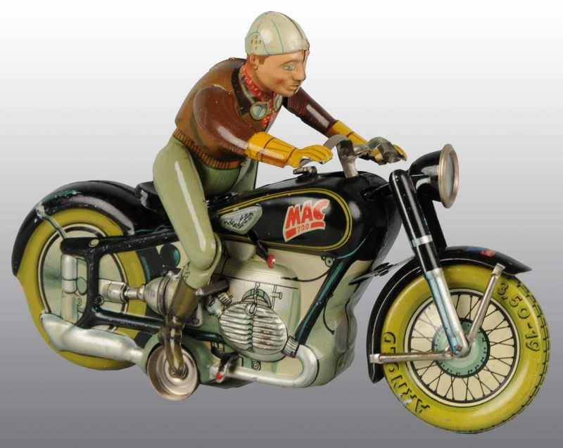 Appraisal: Tin Litho MAC Motorcycle Wind-Up Toy Description German Working Made