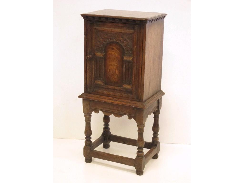 Appraisal: An th Century style oak Pot Cupboard with arched panelled