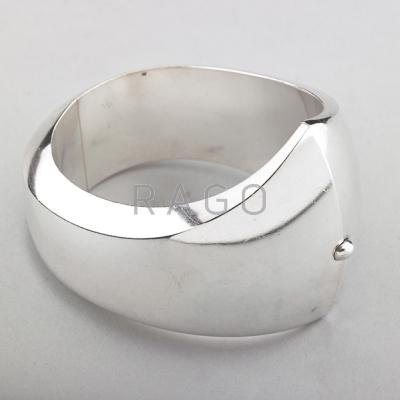 Appraisal: GEORG JENSEN SILVER HINGED CUFF Asymmetric Modernist design by Nanna