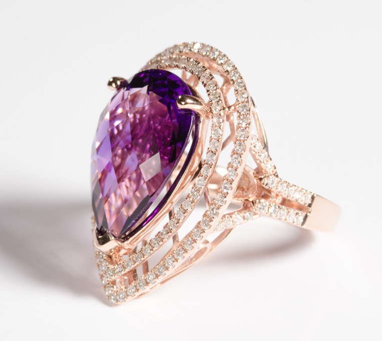 Appraisal: AMETHYST AND FOURTEEN KARAT ROSE GOLD RING with two rows