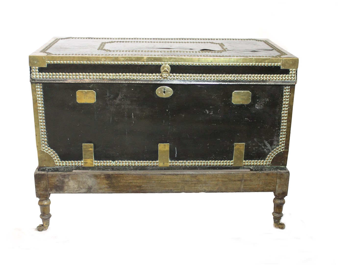 Appraisal: A th century leather veneered brass studded camphorwood trunk on