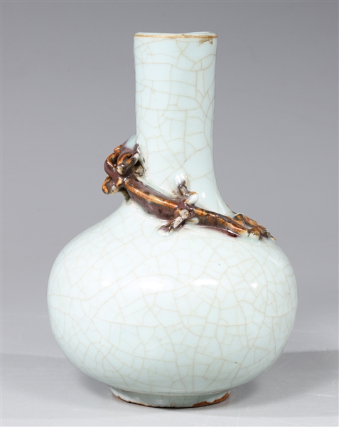 Appraisal: Chinese celadon crackle glazed bottle vase with molded dragon to