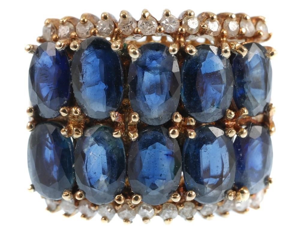 Appraisal: K yellow gold ring contains oval faceted sapphires WEIGHT Ct