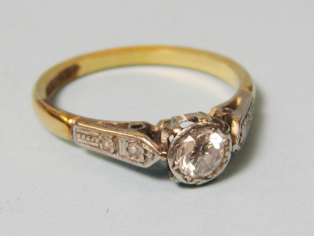 Appraisal: An ct gold and platinum Ring set central diamond approx