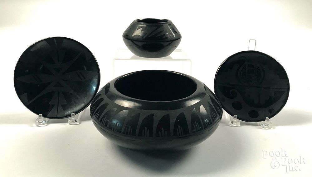 Appraisal: Pueblo Indian blackware pottery Four pieces of Pueblo Indian blackware