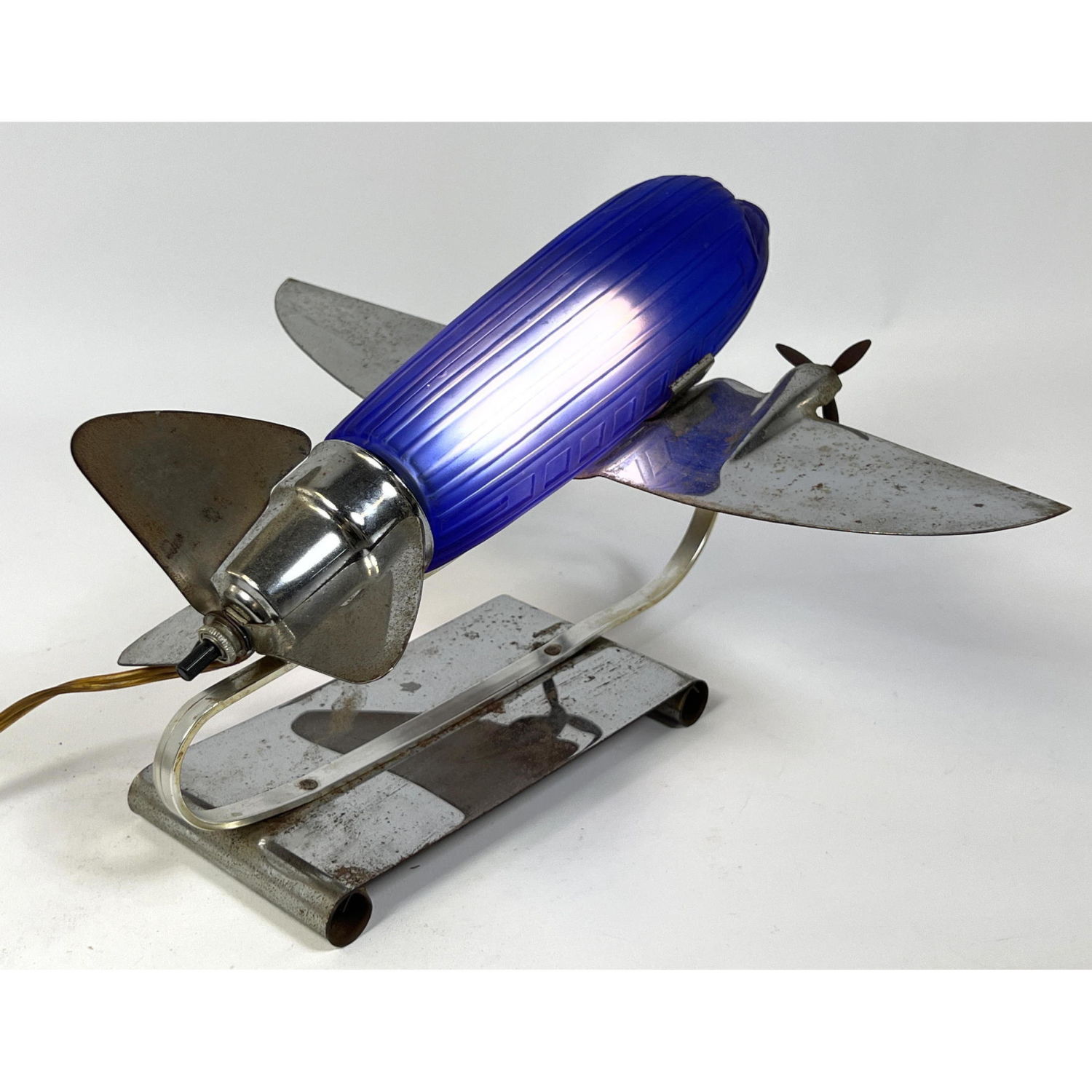 Appraisal: Sarsaparilla Deco inspired Light Design airplane lamp Dimensions H inches