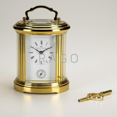 Appraisal: MATTHEW NORMAN Gilt brass carriage clock with key Switzerland mid-to