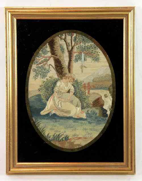 Appraisal: A late th Century needlework picture shepherdess seated beneath a