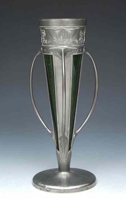 Appraisal: A Liberty Co pewter vase with green glass lining three