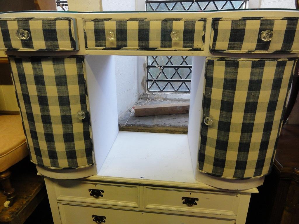 Appraisal: A kneehole pedestal dressing table with plate glass top over