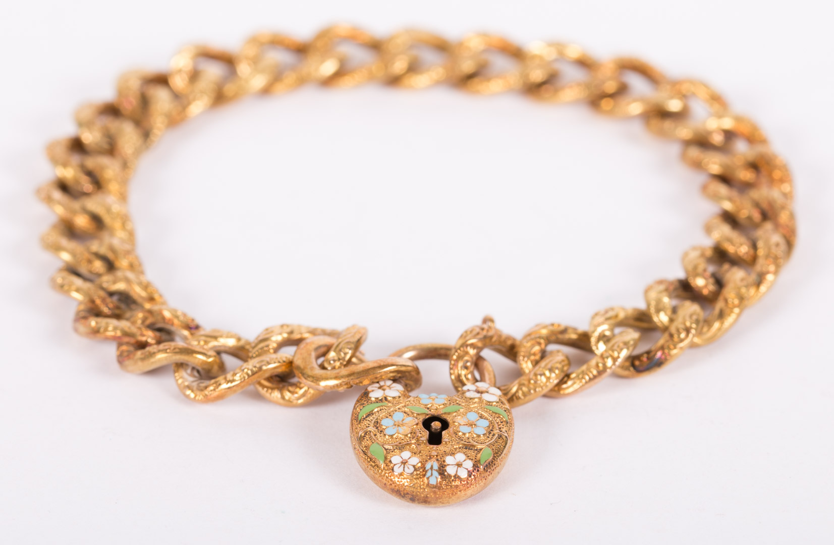 Appraisal: A Victorian Bracelet K links with enamel heart lock charm