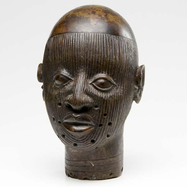 Appraisal: NIGERIAN BRONZE HEAD Ife style head of a woman Height