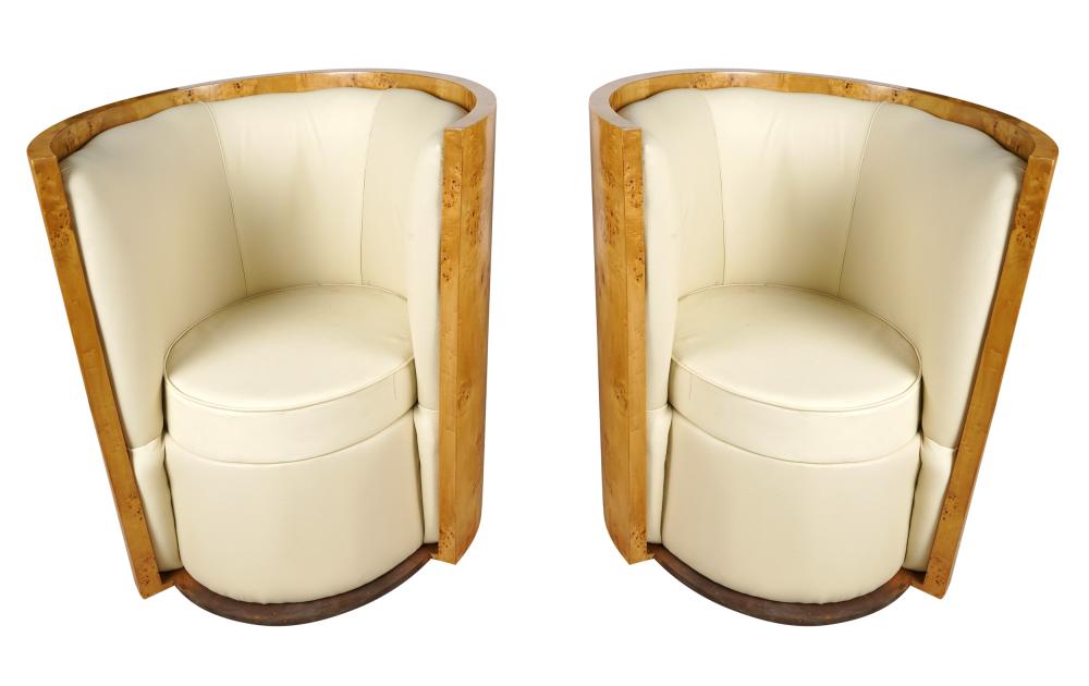 Appraisal: PAIR OF DECO-STYLE BIRCH BARRELL CHAIRScontemporary covered with cream-colored leather