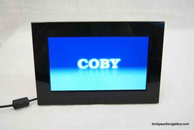 Appraisal: Coby DP '' LCD Digital Photo FrameFrom the estate is