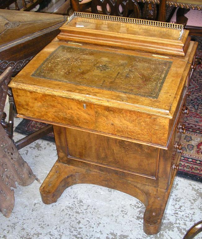 Appraisal: A Victorian figured walnut davenport -