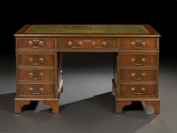 Appraisal: George III-Style Mahogany Pedestal Desk the canted rectangular top with