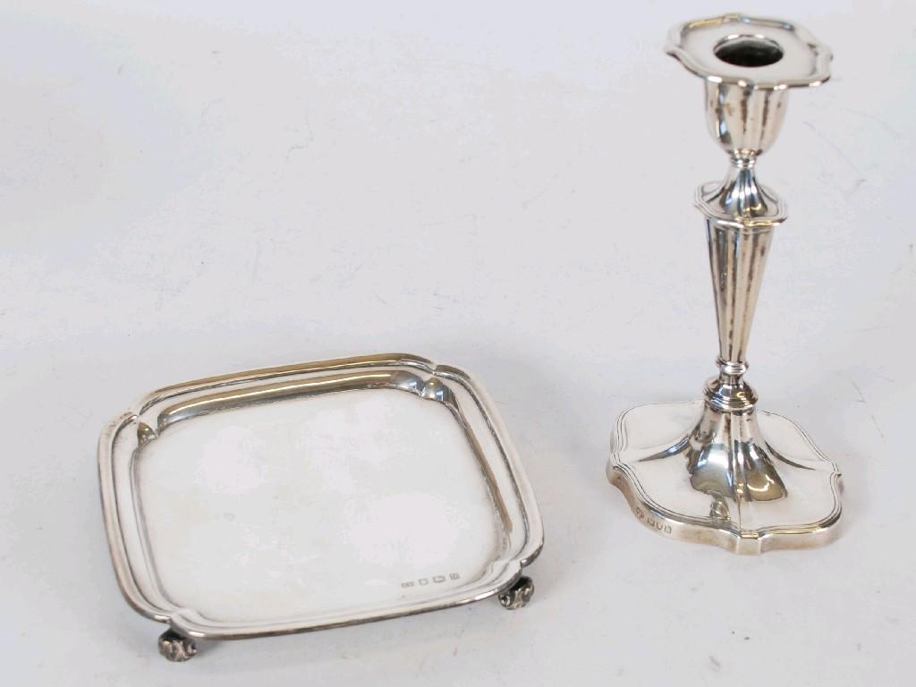 Appraisal: SMALL SILVER ROUNDED-SQUARE WAITER standing on four leaf sheathed scroll