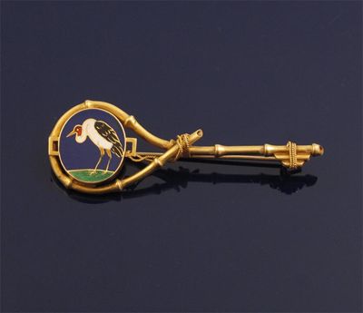 Appraisal: A gold bamboo brooch with enamel plaque depicting a crane